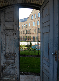 View to the new building through old door