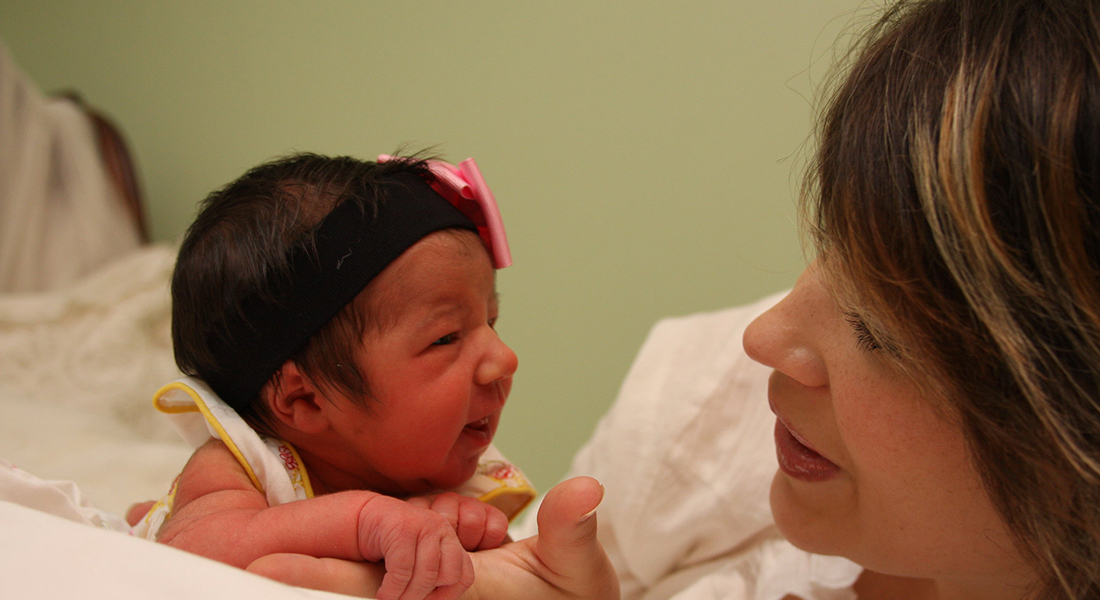 Mom with infant. Photo: Diane Neile - Flickr