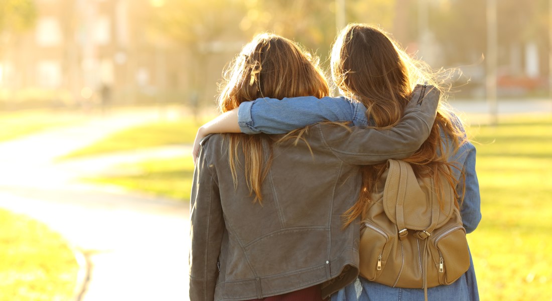 Teenage girls seen from behind